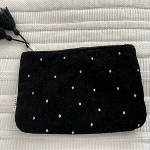 Sezane velvet cosmetic bag or clutch with tassels. Never used.